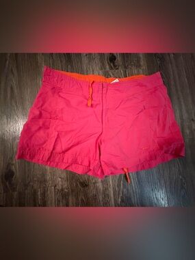Nike Women’s Pink Athletic Shorts with Orange Waistband